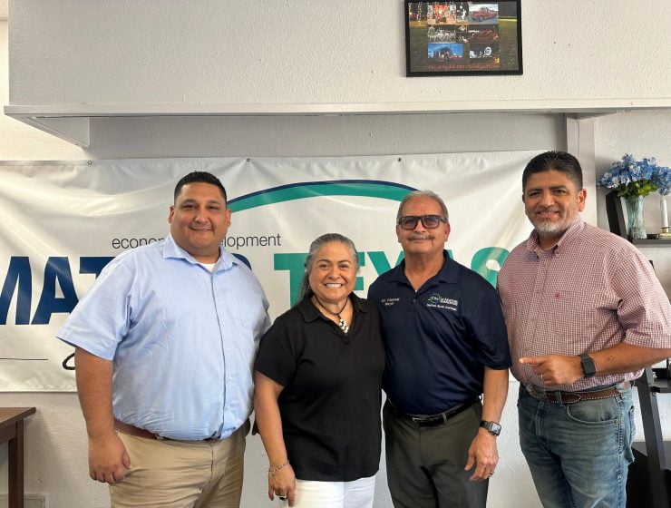 Bernadette Gibson being sworn in by Mayor Ciri Villarreal, alongside Isreal Gonzales and Sabas Encinia.